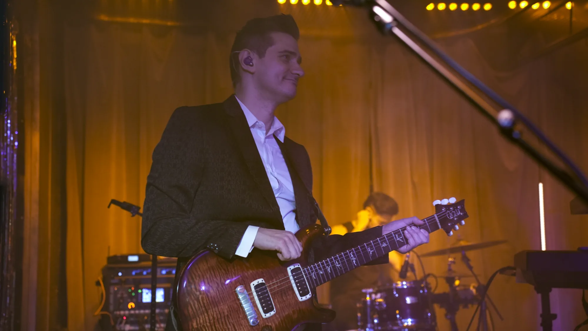 Guitarist on stage during a Don’t Believe in Ghosts performance